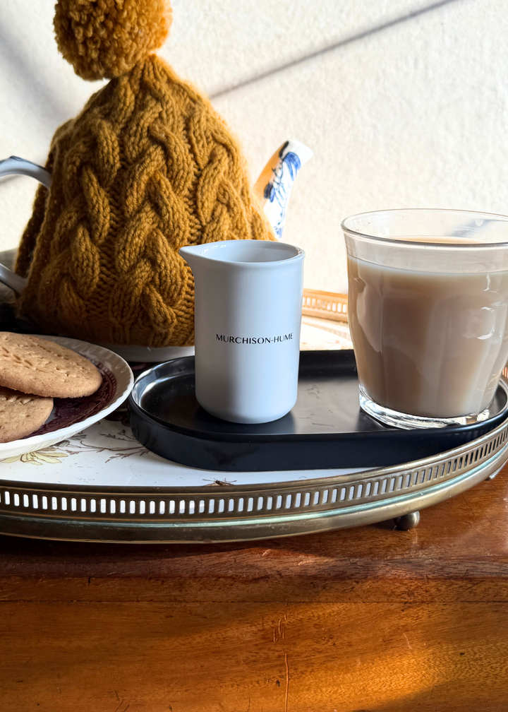 Ceramic measuring cup showing spill-free spout design
