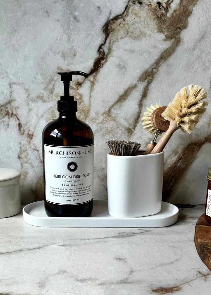 Eco-friendly dish soap in refillable amber glass bottle with premium saddle pump for dishwashing