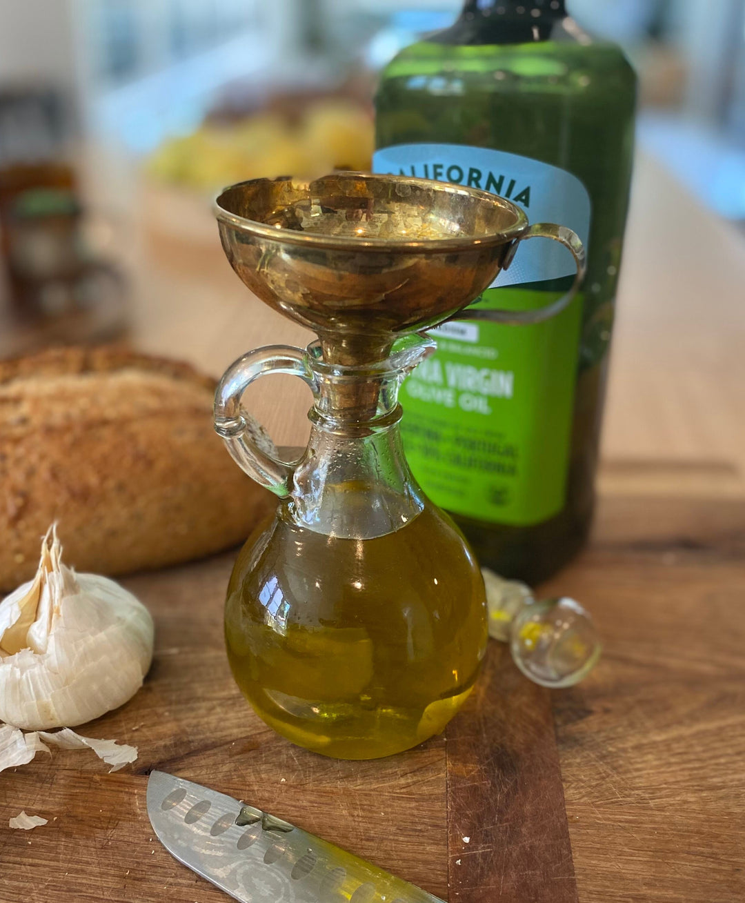 Brass funnel being used to refill cleaning product bottle for sustainable zero-waste living