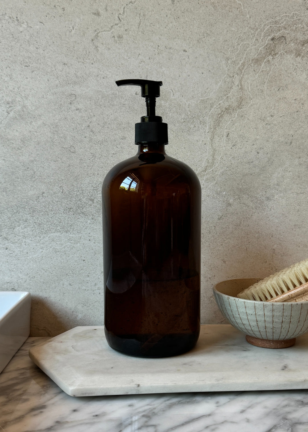 Amber glass bottle 32oz with black pump dispenser for refillable hand soap and cleaning products